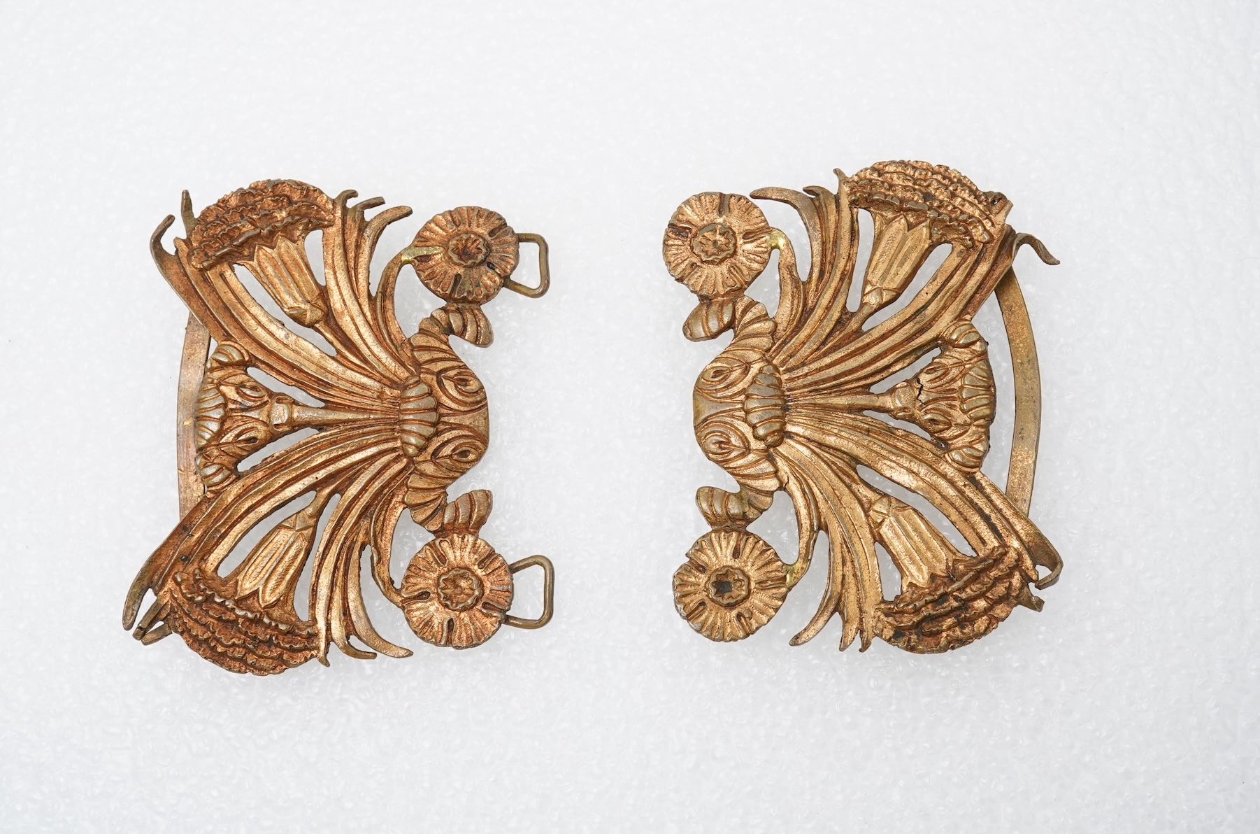 Line Vautrin, a gilt bronze belt buckle